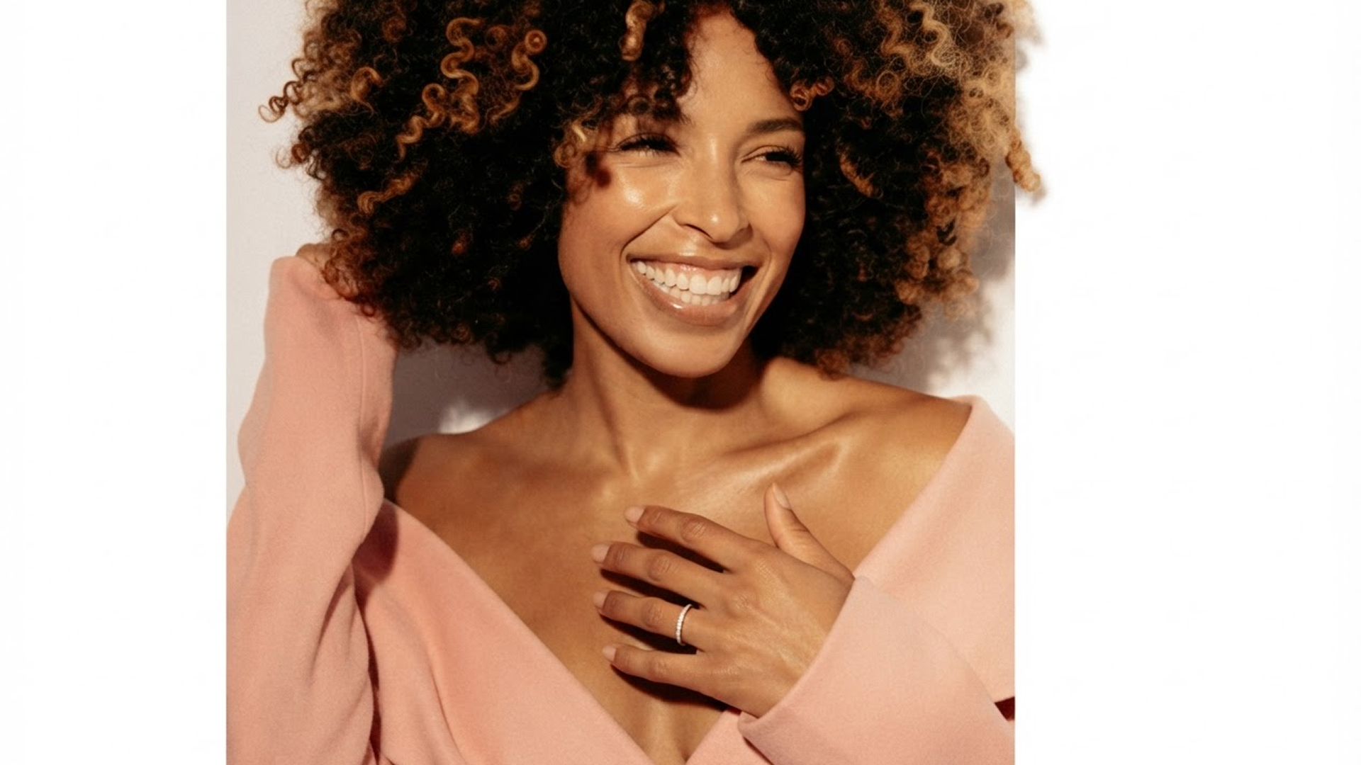 Woman smiling with her wedding ring visible
