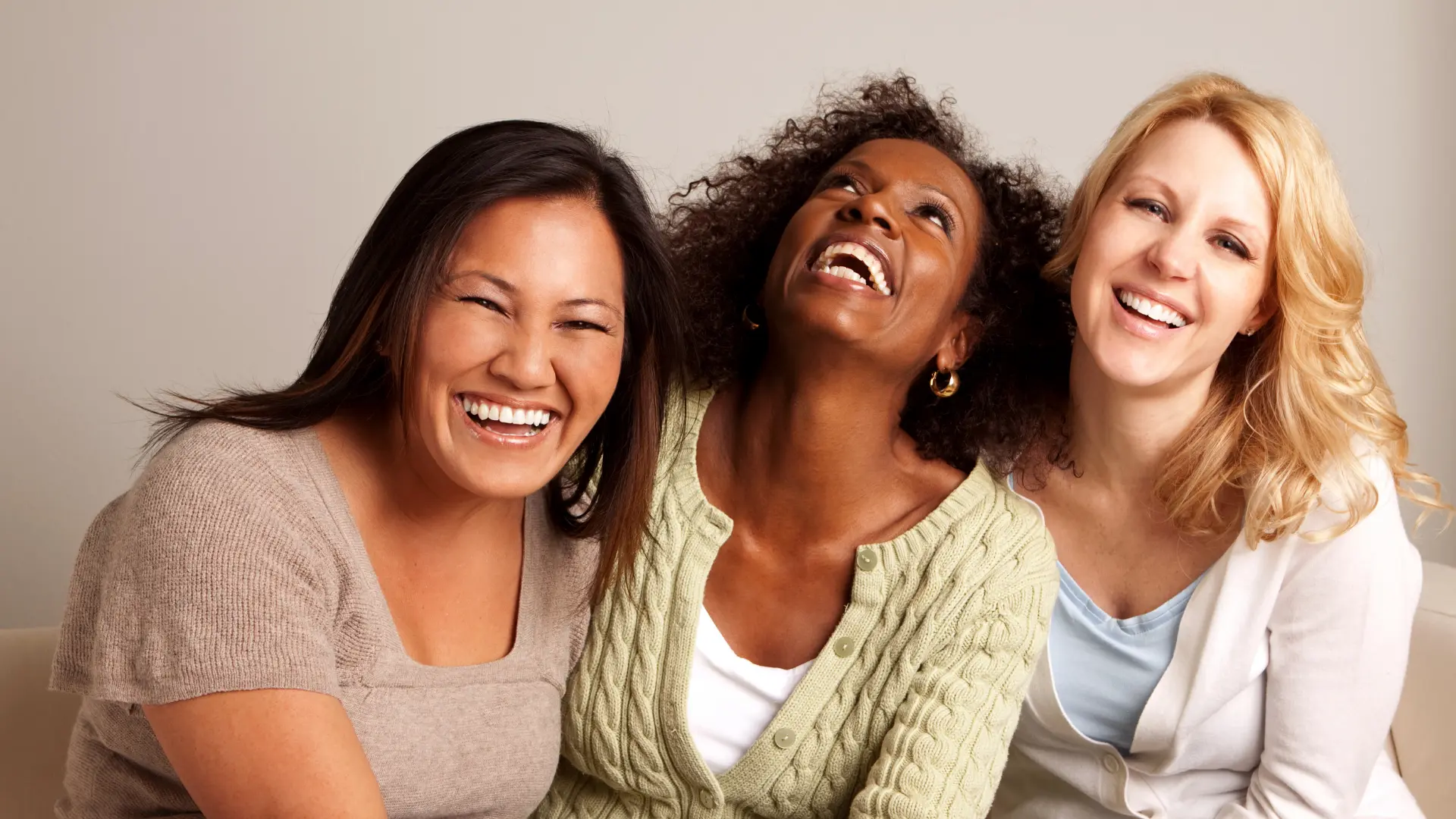 Women laughing together outdoors